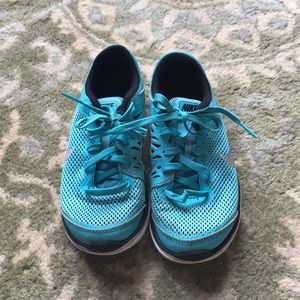 Girls teal Nikes!